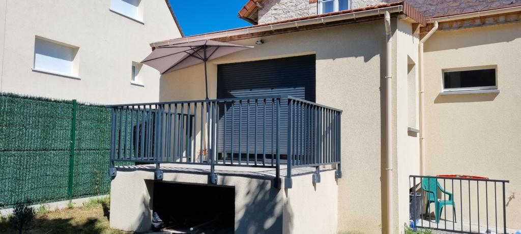 Terrasse surélevée avec installation d'un garde corps